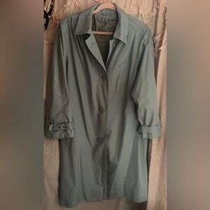 Women’s light blue trench coat. Plaid inside. Size 46 Great for spring.